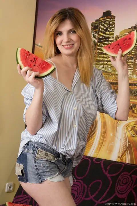 Blonde with Big Tits Pulls Panties Aside and Eats Watermelon – photo 2 of 21