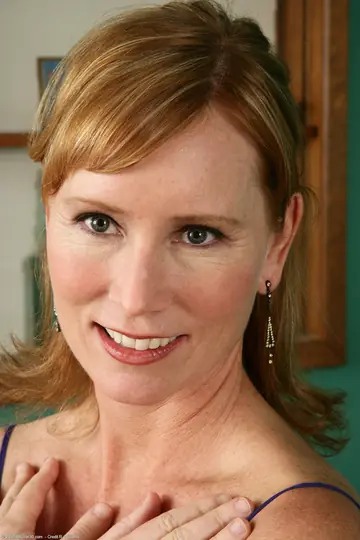 Mature Redhead MILF Undresses and Spreads Her Pussy Wide