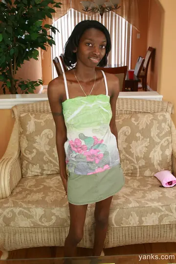 Slim Ebony Woman Strips Off Her Panties and Fucks Herself with a Dildo