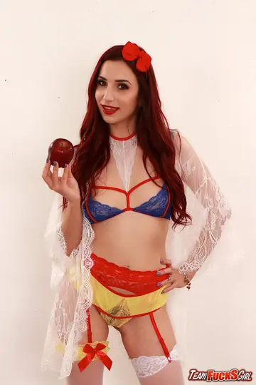 April Snow – Redhead in Lingerie Takes a Group Facial