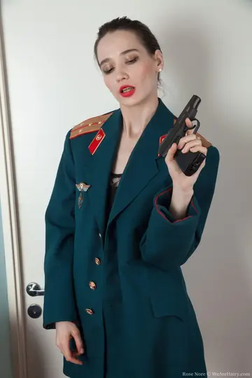 Rose Nore – Russian Brunette Strips Out of Her Police Uniform to Show Her Hairy Pussy