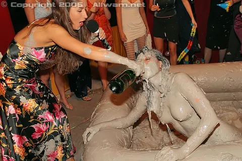 Woman Wrestles Opponent in Mud Pit – photo 8 of 15