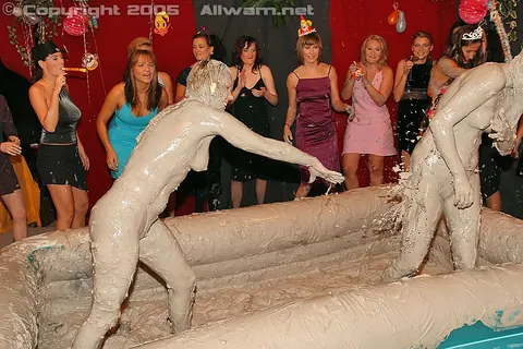Woman Wrestles Opponent in Mud Pit – photo 9 of 15