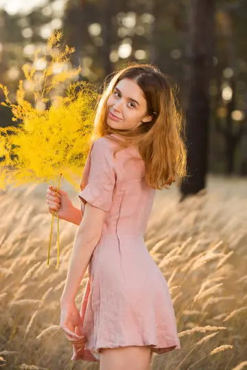 Woman Undresses and Poses Nude for Glamour Shots