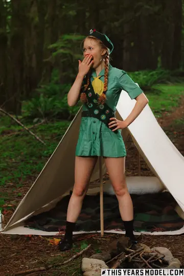 Pale Skinny Redhead in Pigtails Strips Out of Her Uniform Outdoors