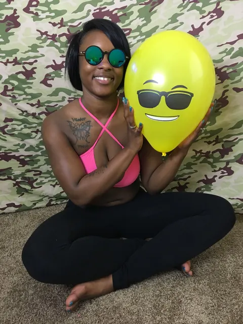 Kassey Starr: Ebony Brunette Shows Off Cleavage with a Balloon Outdoors – photo 12 of 18