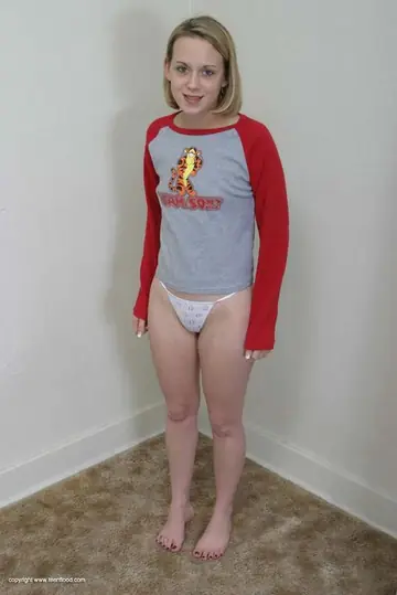 Slim Blonde Pulls Aside Her Panties and Spreads Her Hairy Pussy
