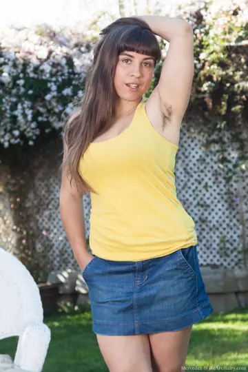 Thick Brunette Flashes Hairy Armpits and Spreads Her Bush Outdoors