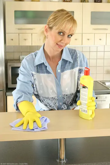 Busty Blonde MILF Strips and Spreads in the Kitchen