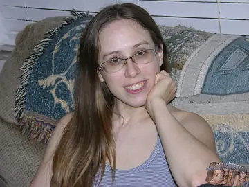 Busty Brunette in Glasses Gives a Handjob Then Spreads Her Hairy Pussy