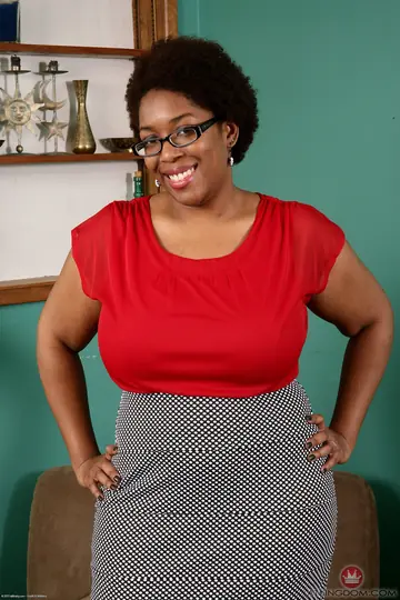 Thick Ebony MILF Undresses and Spreads Hairy Holes