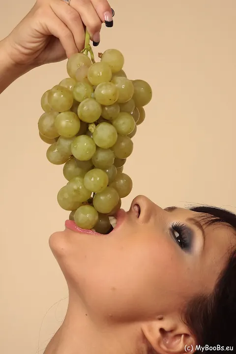 Busty Latina MILF Undresses While Eating Grapes – photo 1 of 16