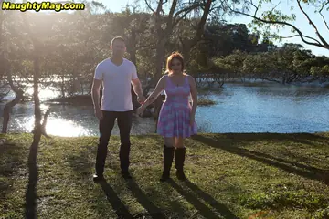 Curvy Redhead MILF Gives a Blowjob and Titjob Outdoors