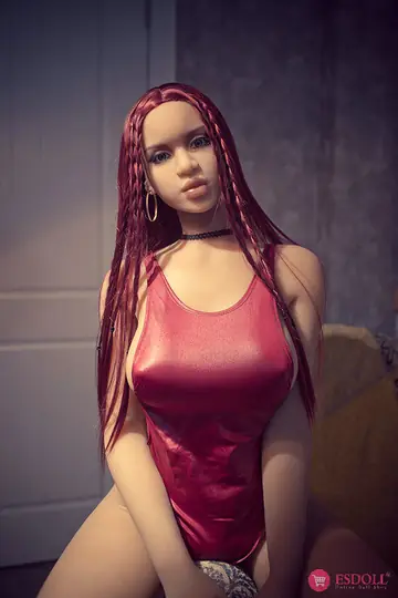 Redhead with Big Tits Poses Nude