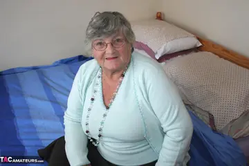 BBW Brunette Poses in Lingerie and Stockings
