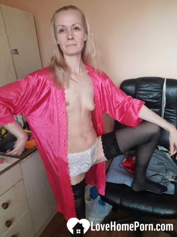 Skinny MILF in Stockings Plays with a Toy and Spreads Her Hairy Pussy