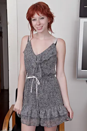 Petite Redhead Poses Nude and Shows Her Feet