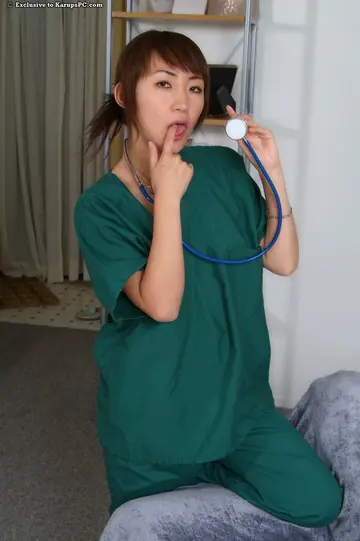Asian Woman in Panties Pulls Them Aside and Spreads Her Ass