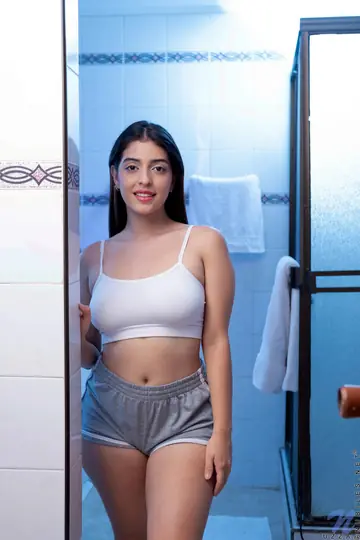 Latina with Big Tits Strips Out of Her Shorts