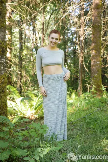 Stephie Staar – Pale Redhead Stands Naked and Fingers Her Pussy in a Forest
