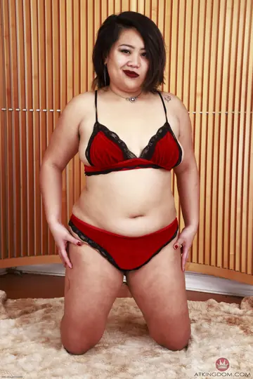 Asian MILF Undresses to Reveal Her Hairy Pussy