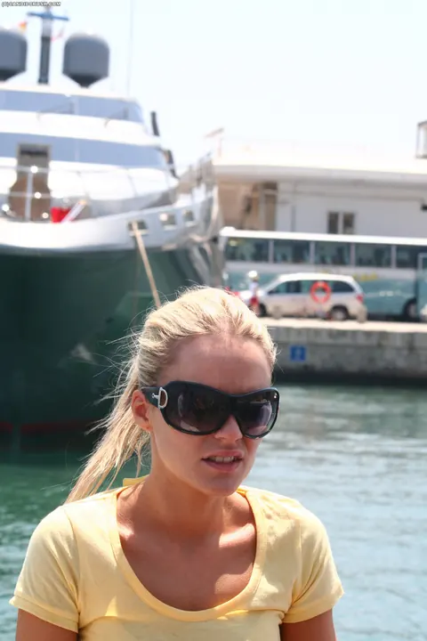 Woman in a Bikini and Skirt Flashes Publicly at the Beach – photo 6 of 16