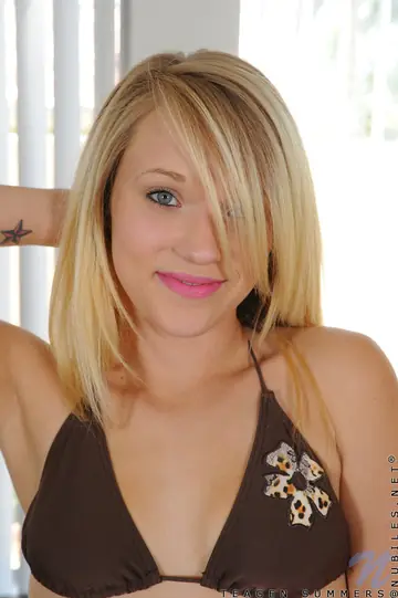 Blonde in Lingerie Pleasures Herself with a Magic Wand