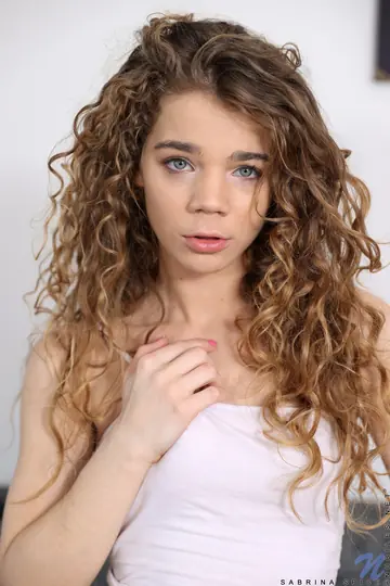 Sabrina Spice – Petite Curly Babe in Uniform Spreads Her Pierced Pussy