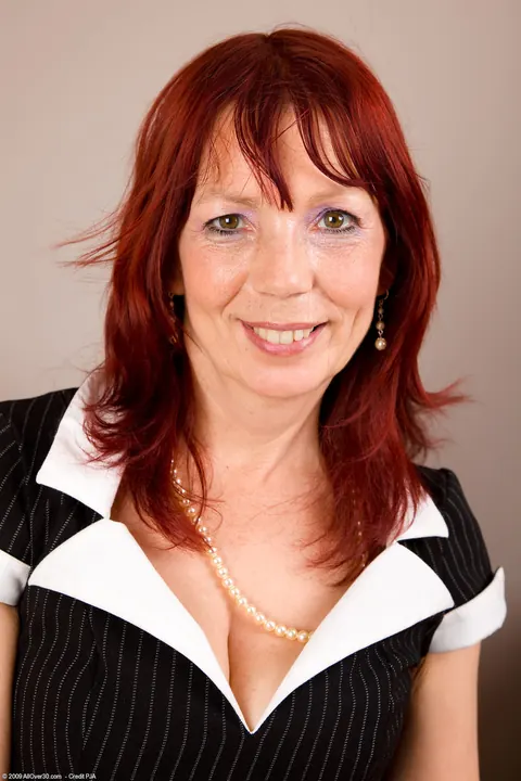 Redhead MILF Dildos Herself in an Office Uniform – photo 1 of 21