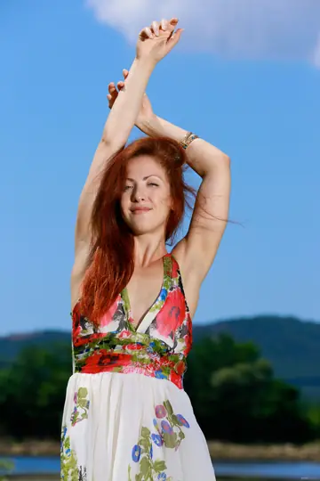 Redhead Lifts Her Skirt and Spreads Her Pussy Outdoors
