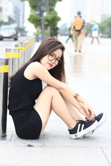 Petite Asian Brunette Flashes Her Body in a Dress Outdoors