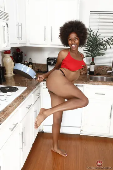 Thick Ebony Woman Pulls Aside Her Panties to Spread Her Hairy Pussy