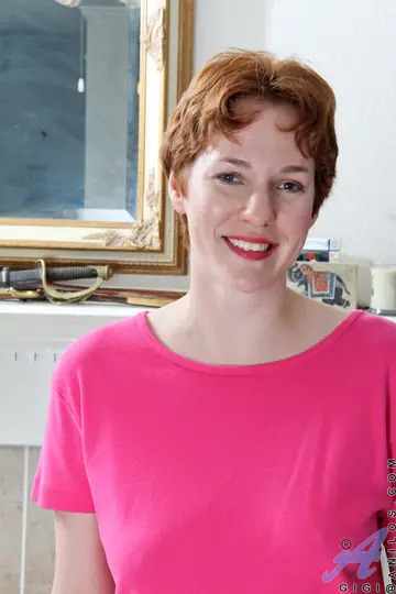 Short-Haired Redhead MILF Uses a Dildo and Spreads Her Pussy