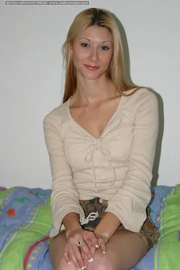 Blonde MILF Strips Out of Her Skirt for a Solo Tease