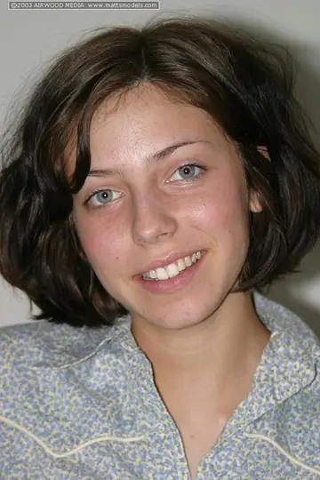 Short-Haired Brunette Amateur Strips and Fingers in Bed