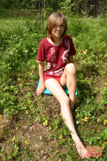 Russian MILF Strips Nude in the Forest