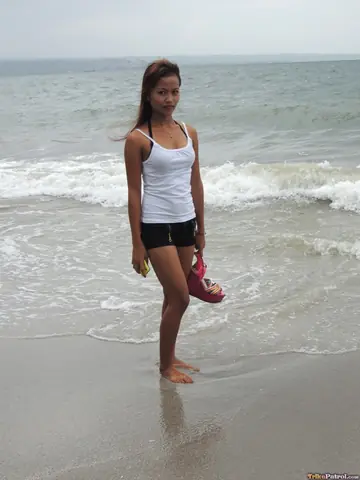 Slim Filipina Strips Naked on the Beach