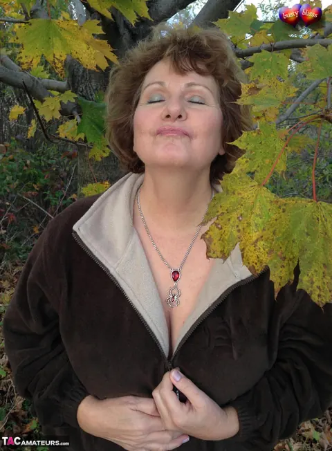 Bustybliss: Mature Curvy Brunette Undresses Outdoors Under a Tree – photo 5 of 20