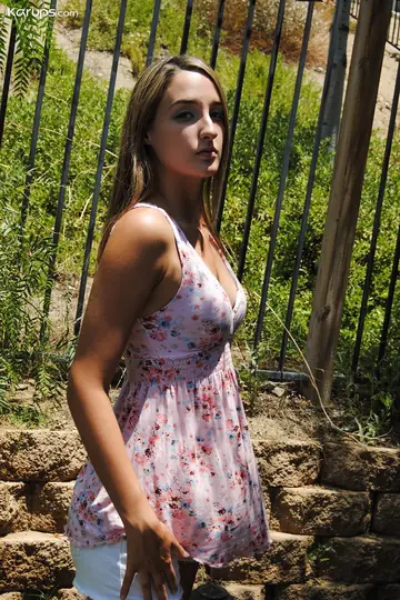 Slim Amateur Strips Nude and Shows Her Pierced Nipples and Navel Outdoors