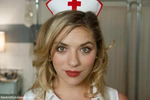 Lia Lor: Blonde Nurse in Uniform Bound and Teasing with Natural Tits – photo 18 of 19