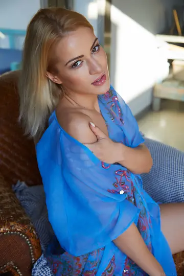 Cherry Kiss – Tattooed Blonde Strips Nude and Poses