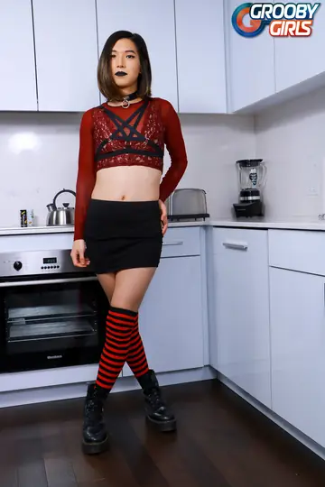 Asian Trans Woman Undresses Fully and Poses Nude Arching Her Back