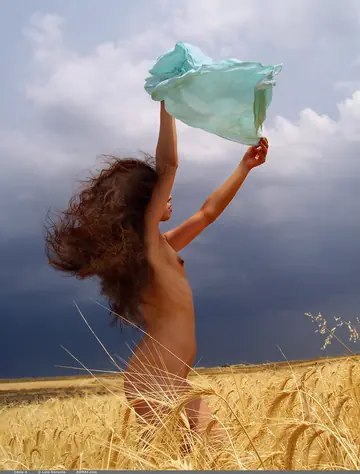 Skinny Woman with Small Tits Poses Nude Outdoors