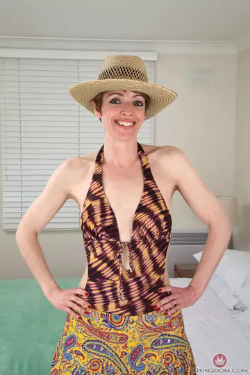 Slim MILF Strips Off Her Leopard Bikini and Spreads Her Hairy Pussy