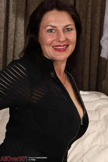 Mature Brunette MILF Undresses and Reveals Her Hairy Bush
