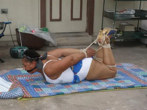Mature Ebony BBW Hogtied and Cleave Gagged Outdoors – photo 4 of 16