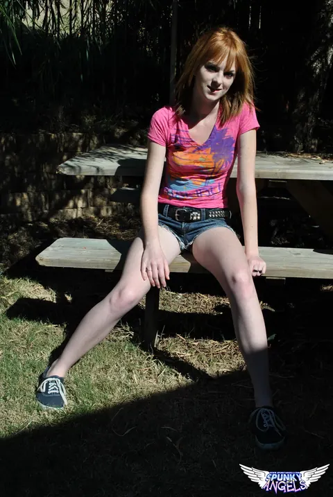 Kate Cooper: Busty British Redhead Spreads in Shorts Outdoors – photo 1 of 12