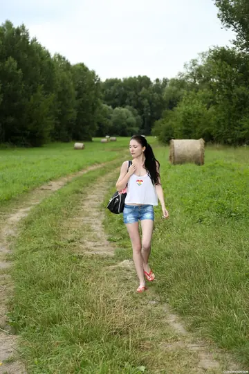 Mia Evans – Slim Hungarian Brunette Strips Out of Her Shorts in the Forest