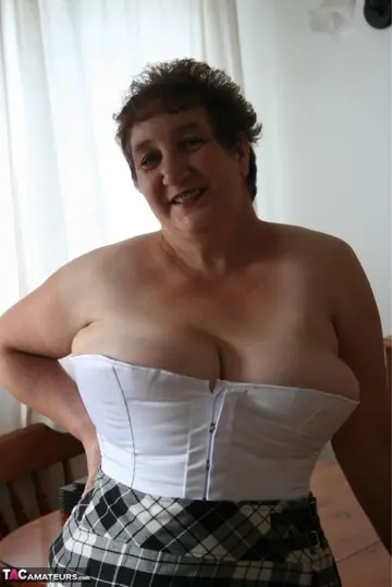 Kinky Carol – Thick British MILF Flaunts Her Big Ass in a Skirt and Stockings