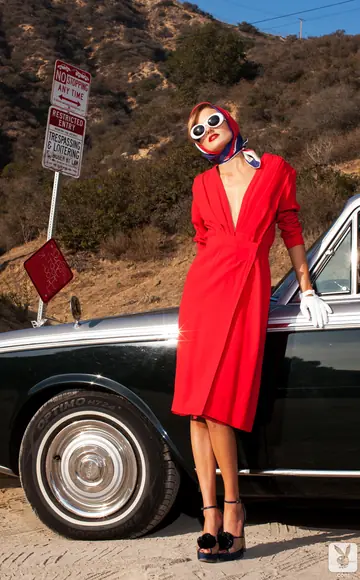 Amanda Booth – Tall Slim Blonde in Glasses Spreads Her Legs Outdoors by a Car